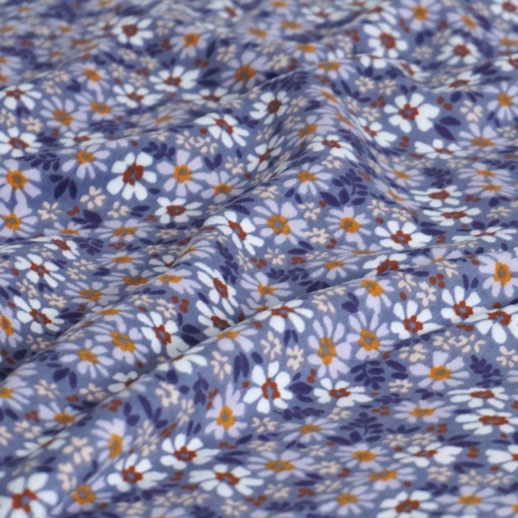 Nickistoff bedruckt Gänseblümchen fliederlila